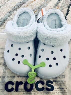 CROCS Fuzzy Lined Clog in Light Blue.     NWT
